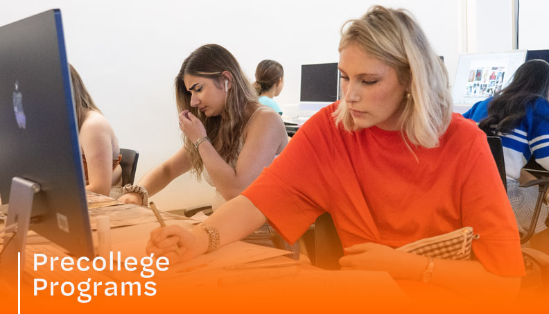Students smiling in the computer lab